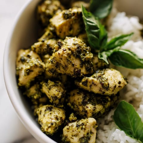 Served with juicy diced tomatoes and pine nuts, this vibrant bowl offers a comforting and flavorful weeknight dinner.  